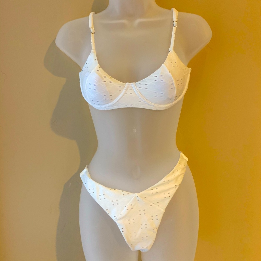 White bikini. Med. Bra top/cheeky bottom.NWOT.